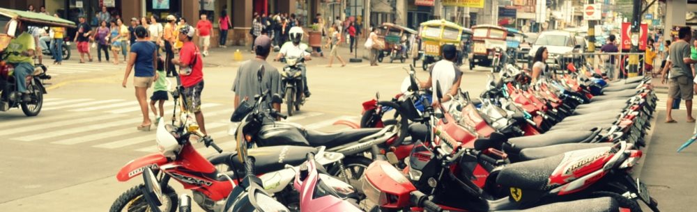 Dumaguete, Philippines - Motorbikes lined up on Perdices