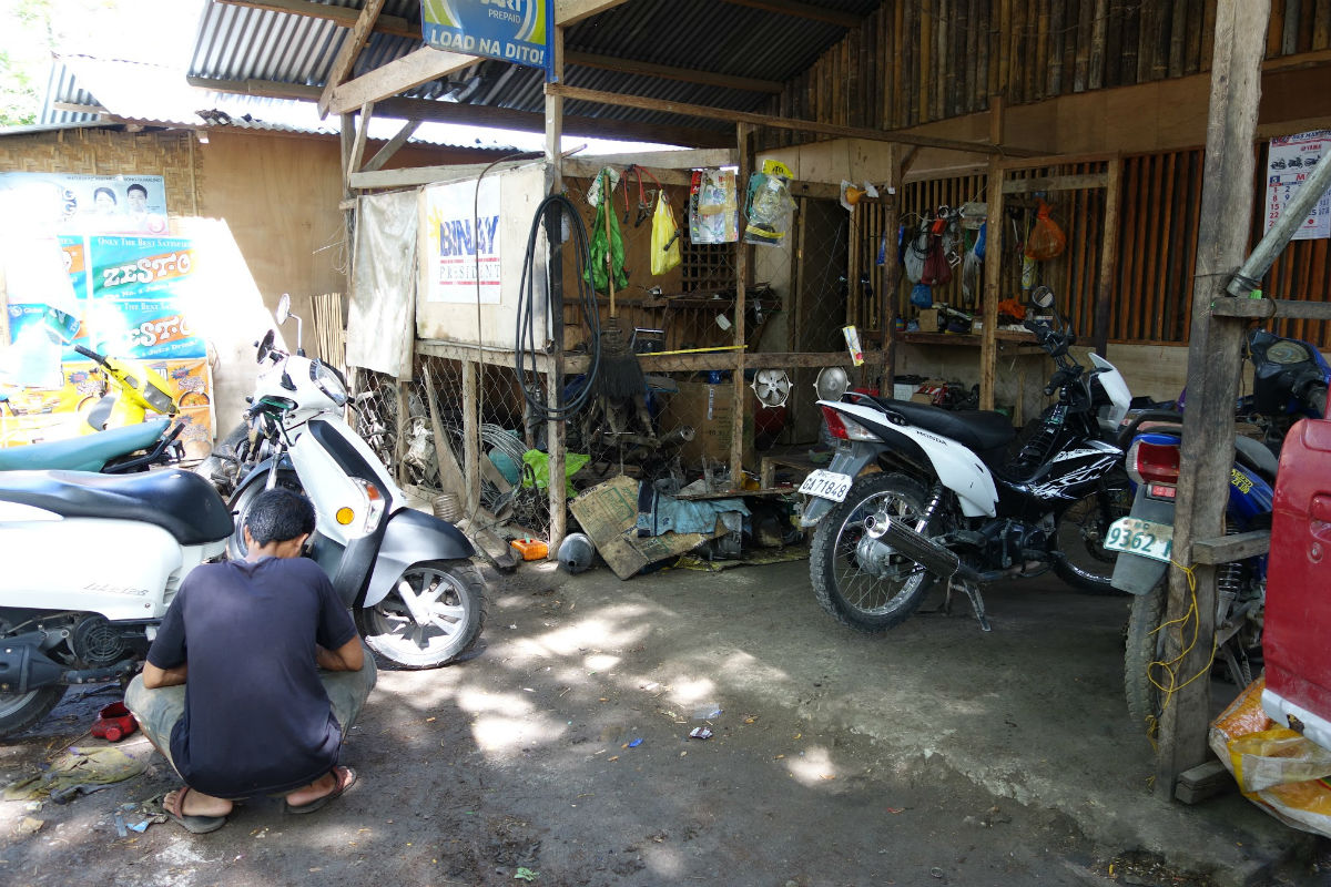 Fixing the rental bike in Bohol